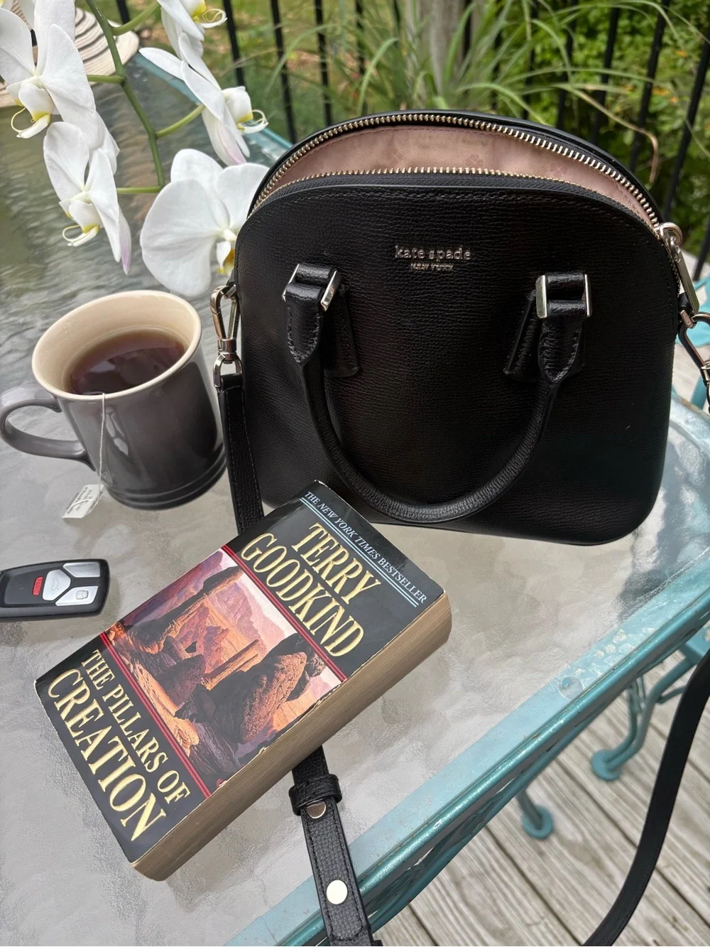 kate spade black leather dome crossbody with gold hardware